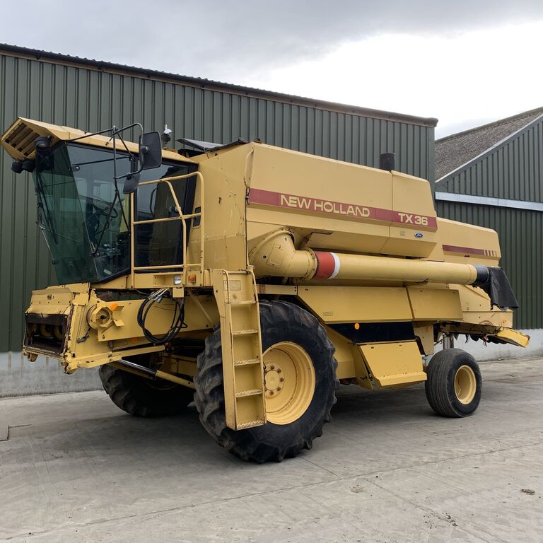 farm-equipment-combine-harvesterNEW-HOLLAND-TX36-cw-20ft-Header---1594656165757120841_big--20071319015763397400