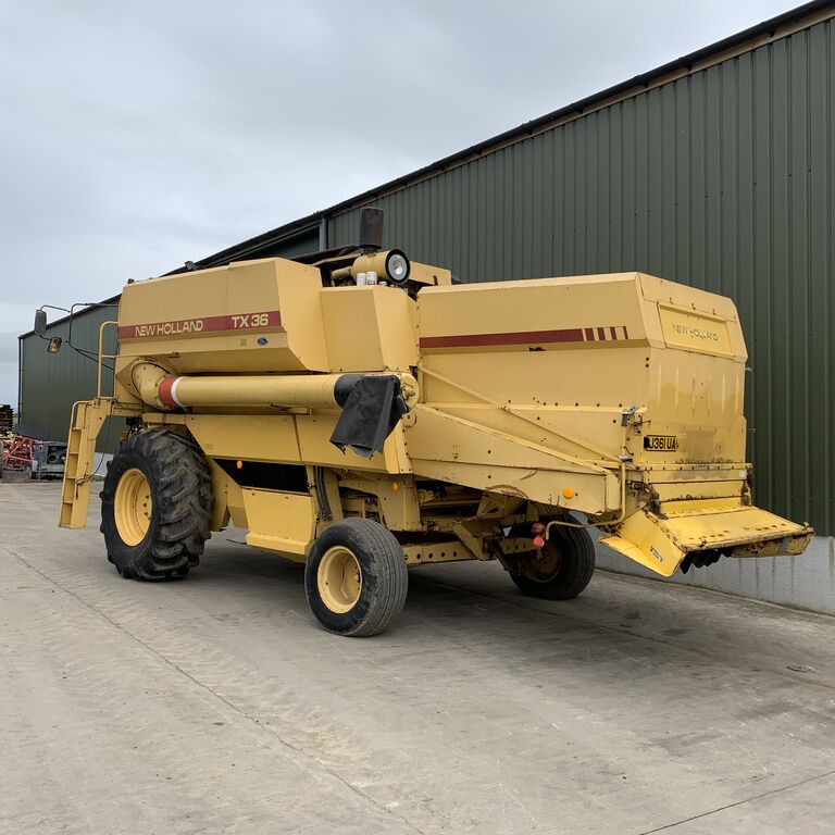 farm-equipment-combine-harvesterNEW-HOLLAND-TX36-cw-20ft-Header---1594656167734486353_big--20071319015763397400